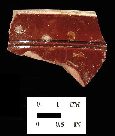 Rim sherds decorated with white slip, engine turning, and gold ename - Angelica Knolls, 18CV60. 