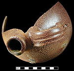 English salt glazed stoneware bottle. Strap handle.  Top portion of vessel has been dipped in iron oxide.  Vessel #2338, from 18PR175. Vessel may be similar to one shown on right.