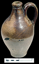English brown salt glazed stoneware bottle, c. 1740 (similar to one shown on left). Owned by the Chipstone Foundation.  Image from  Digital Library for the Decorative Arts and Material Culture, University of Wisconsin, Madison. Object Identifier: DLDecArts.Ceramics.199800901.bib