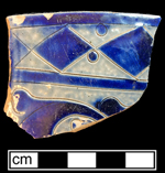 Gray-bodied salt glaze stoneware hollow  (mug or jug) with engraved (incised) checkered motif painted in cobalt-blue under the glaze, from 18CV60.