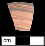 Biscuit fired thrown agateware sherd in unidentified hollow form, probably a teapot or jug.  This waster sherd is comprised of the blending of three different clay colors and was discarded prior to glazing - Agateware was one of the first earthenware ceramics to be fired twice: the first firing produced an unglazed, biscuit-fired vessel, which was then glazed and fired a second time - Collected by George L. Miller in 1986 in Staffordshire in Hanley.  Cannot be attributed to a specific pottery.