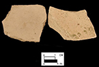 Probable yellow border ware of indeterminate vessel form. Glazed interior (left) and unglazed exterior (right) body sherds from 18CV83.