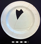 Creamware plate, undecorated rim. Rim diameter: 7.60”. Lot: 47G 357-6. 18BC50.