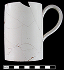 Undecorated creamware mug that has been mended from 18ST642-NAVAIR.