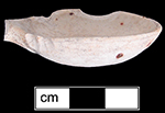 Side view of unglazed waster spoon bowl Collected by George L. Miller in 1986 in Staffordshire, England.