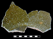 North Devon gravel tempered pan. Glazed interior and unglazed exterior. Approximately 6.5” base diameter.