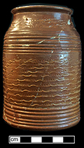 Nottingham stoneware jar with incised decoration. Vessel height: 5.25”, Rim diameter: 3.00”, Base diameter: 3.75”. Lot: 19, Provenience: 1112.551, Privy Stratum 4. 18BC38