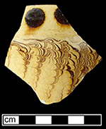 North Midlands combed and dotted slipware cup.  Dotted decoration common in 17th and 18th century.  Glazed interior and exterior.  Rim diameter  approximately 5” - Collected by George L. Miller in 1986 in Staffordshire, England.
