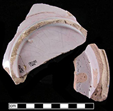 Hollow unidentified vessel fragments from 18CV60 with pinkish coloration to glaze caused by calcareous clays containing trace elements of chrome, which come out pink when combined with tin in the glaze.  This color has no dating implications.