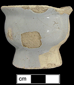 Ovoid ointment pot with everted rim and flared foot.
