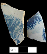 Hollow vessels decorated with sponging in blue.
