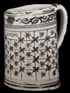 Whole example of a chinese common shaped cup with painted star and grid pattern from a private collection.