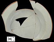 Edge painted plate - rim lines appear on dated vessels between 1730s to 1790s, with highest occurrence in 1730s and 1740s (Shlasko 1989). Rim line is usually a reddish or brown color and is believed to have been done in imitation of Chinese porcelain.