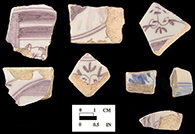 Manganese and cobalt painted tile fragments.
