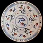 Whole plate example of similar scroll pattern shown on right - Private collection.