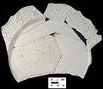 Molded plate rim with molded 'dot, diaper, basket'  pattern, close up on right. Antietam Furnace, 18WA288.