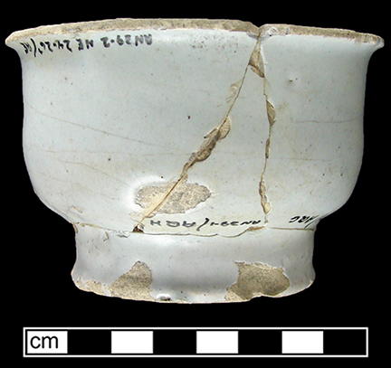 Nineteenth-century French  ointment pot with stenciled label, with white tin glazed interior.