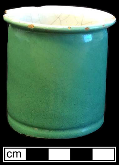 Nineteenth-century French ointment pot with white tin glazed interior and green tin glazed exterior.  Stencilled initials D. R. on base. Rim diameter: 2.5”; Base diameter: 2.25”; Vessel height: 2.5” - from 18BC33.