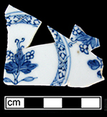 Chinese porcelain saucers painted underglaze in blue with trellis pattern in cavetto – dates c. 1690-1797 (Madsen and White 2011:73) and with blue and white floral reserves (c. 1700-1751). Minimum Vessel 57 (same number assigned to two distinct vessels by project archaeologists). Lots 2301, 2320, 2210.