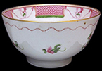 English soft paste porcelain common shape cup painted in overglaze enamels in pink, red, blue and green in floral motif.  Most likely Lowestoft. 3.5” rim diameter, 2” vessel height. View of exterior and interior.  Date Range:      c. 1780-1800.