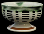 Pearlware salt with engine turned pattern and green glazed rilling or reeding. 1.5 inches in height - from a private collection.