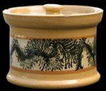 Yellow-bodied mustard pot and cover with brown and white slip bands and mocha decoration. Possibly made by the Cap Rouge Pottery, Quebec, 2 inches in height - from a private collection.