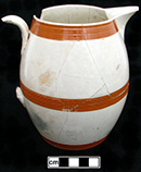 Baluster-form jug with orange-glazed rilled or reeded bands, Close-up detail of rilled or reeded bands shown on right.
