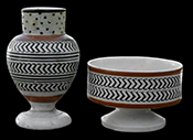 Pepper (left) and Salt. Decorated using inlaid rouletting. The same roulette was used on two forms. Note shape of salt-from a private collection.