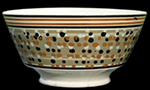 Pearlware London-shape bowl. Dripped decoration, possibly created by a three- chambered slip cup with goose quills separated rather than drawn together as for cat's eyes, c. 1810. 8 inches in diameter - from a private collection.
