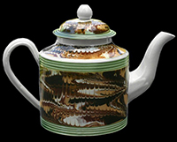 Teapot with combed marbled decoration and green-glazed rilling or reeding. 5.5 inches in height - from a private collection.