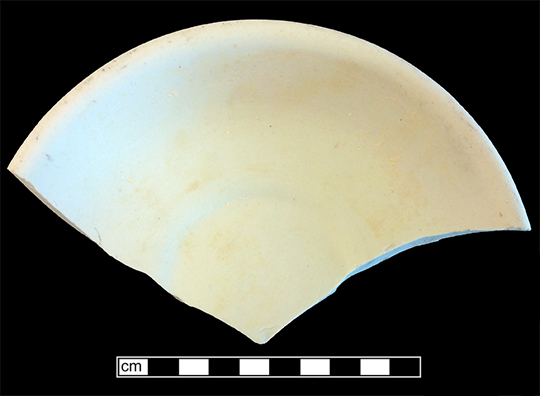 Saucer. Unglazed bisque waster. Rim diameter: 6.5”; 6.2 mm thick. Printed “QMC” mark, abbreviation for Quarter Masters Corps (1912-1923) (Hunter Research Poster)