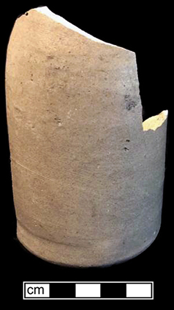 Grey bodied salt glazed stoneware bottle with Albany slipped interior. Base diameter: 2.50”. Lot #: 33-9. 18BC56