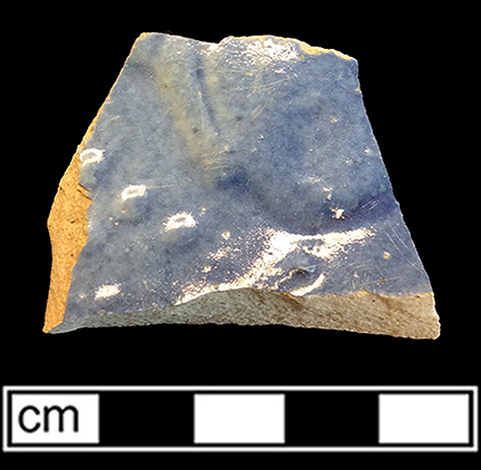 North American stoneware hollow form, probably large utilitarian bowl. Bristol glaze on interior and blue ? exterior glaze. Lot 2. 18CV7