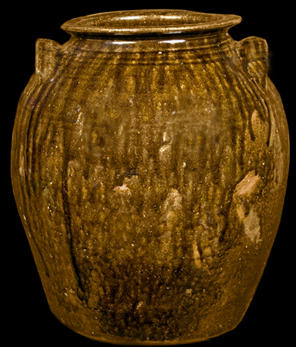 Three-Gallon Alkaline-Glazed Stoneware Jug, Stamped "JFS", James Franklin Seagle,Vale, Lincoln County, NC, third quarter 19th century, highly-ovoid jug with tooled spout, the surface covered in a streaky, olive-green alkaline glaze - from a private collection.
