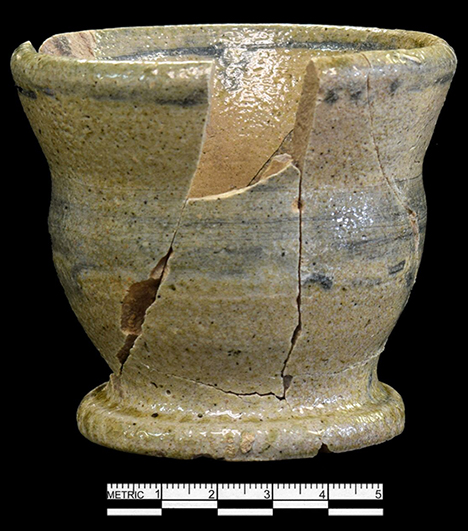 Grey bodied North Carolina Piedmont salt glazed stoneware jar with cobalt banding.