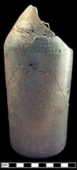 Grey bodied salt glaze stoneware beer bottle impressed "J. GRASBINDER” along shoulder.  The interior of the bottle is covered in Albany slip. Bottle height: approx. 10.50”, base diameter: 3.75”, Minimum Vessel 8, from 18BC27.