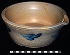 Grey bodied salt glazed stoneware bowl with a pulled spout and cobalt blue painting. Rim diameter: 9.75”, Vessel V-05 from 18MO609.