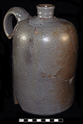 Grey bodied salt glaze stoneware jug. ¾ gallon capacity. The straight sides and definite shoulder on this vessel suggest that it was made after circa 1850. Vessel height: 10:00”, Vessel body diameter:  6.00”, Vessel V-11 from 18MO609.