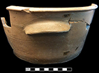 Grey-bodied salt glaze stoneware bowl with cupped lug handle. 11.50” rim diameter, 9.0” base diameter, from 18PR175.