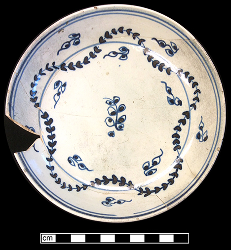 Blue painted saucer and common shape cup in a chinoiserie floral style typical of china glaze and early pearlware. Saucer rim diameter: 5.50”. Lot: 190-99. Cup rim diameter: 3.60”; Cup height: 2.50”. Lot: 190-7. 18BC66