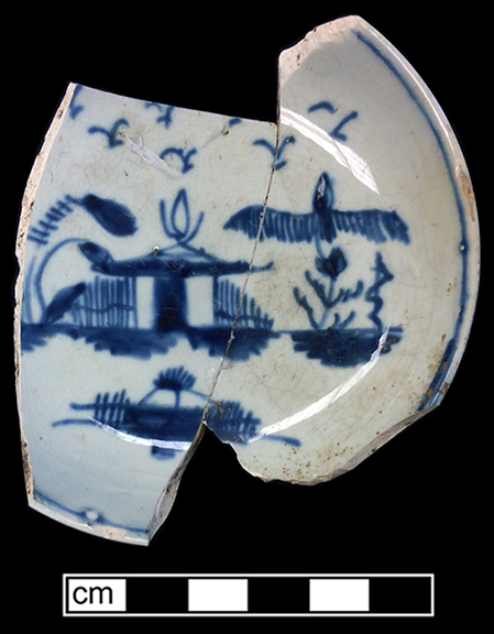 Blue painted saucer in a chinoiserie style typical of china glaze and early pearlware. Rim diameter: 3.50”. Lot: 191-48. 18BC66.