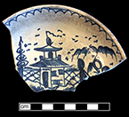 Blue painted pearlware saucer in a chinoiserie style typical of china glaze and early pearlware. Rim diameter: 5.00”. Lot: 191-51. 18BC66