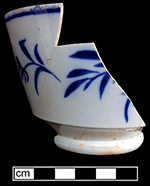 Pearlware painted underglaze London shape cup with floral motif. 3.5” cup rim diameter; 2.5” vessel height.