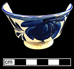Pearlware painted underglaze saucer with leaf motif.   Four matching saucers and two matching cups found in privy assemblage. Impressed maker’s mark on reverse of each saucer:   James and Ralph Clews, Cobridge, 1818-1834. Workmen’s marks on cups. 6.0” saucer rim diameter   4” rim cup diameter, 2.75” vessel height.
