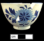 Pearlware painted underglaze common shape cup with floral motif. Below left is photograph of interior rim of cup. 3.75” cup rim diameter; 2.5” cup height.