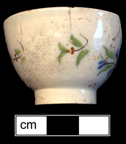 Pearlware polychrome painted underglaze  common shape cup. Rim diameter: 1.50”, Vessel height: 1.25”. Lot: 185-14. 18BC66