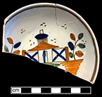 Pearlware saucer, painted underglaze in polychrome colors in Chinese house pattern. Rim diameter: 3.75”. Lot: 47G 360-143-84. 18BC50