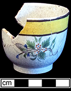 Pearlware polychrome painted underglaze  common shape cup. Rim diameter: 2.50”, Vessel height: 2.00”. Lot: 185-34. 18BC66
