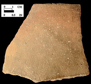 Keyser smoothed over cord-marked rim sherd from Hughes site 18MO1, Feature 22.