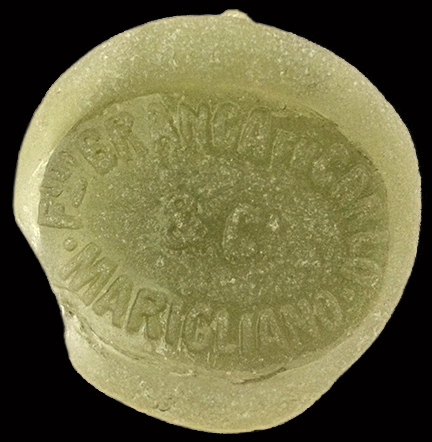 This bottle seal was an isolated find from a beach in Calvert County - This bottle seal was produced by an Italian company formed at Marigliano called Fratelli Branca fu Carlo & Co.  In the early 20th century, a lawsuit was brought against this company by the Milan firm of Fratelli Branca, with the resolution that the Marigliano firm cease using their name to market their vermouth. 